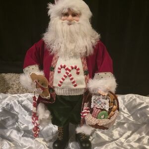 Santa Claus Figurine with Candy Cane Sweater